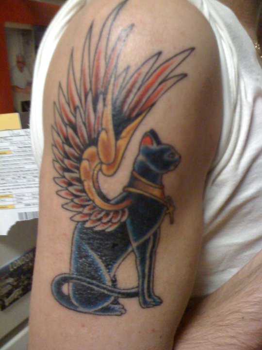 winged-egyptian-bastet-cat-tattoo-on-half-sleeve