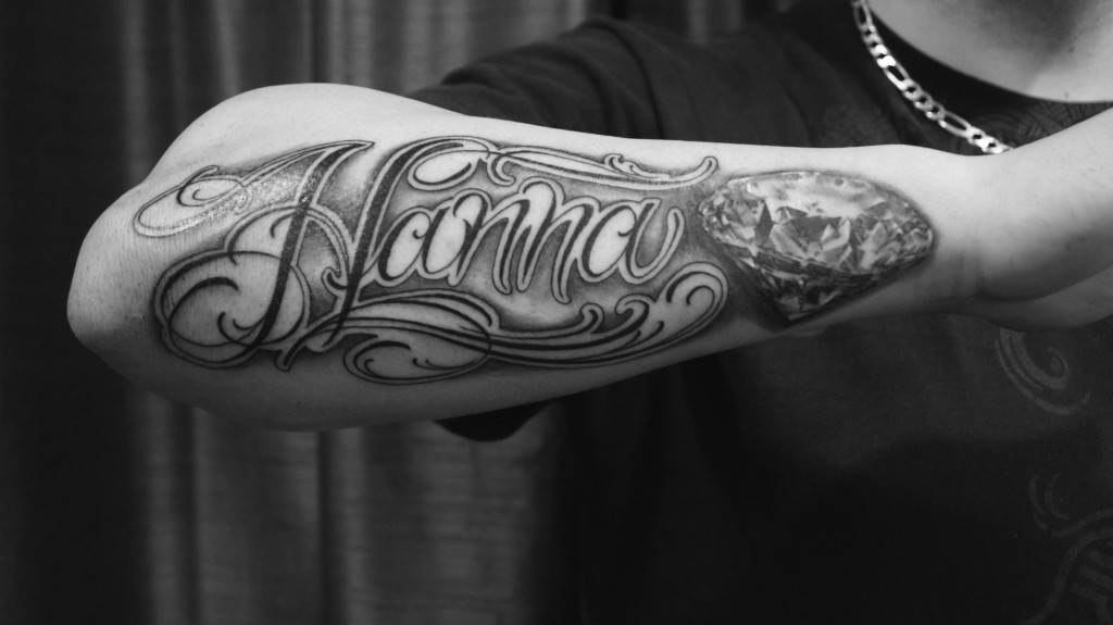 Forearm-black-and-grey-custom-script-tattoo-1024x575